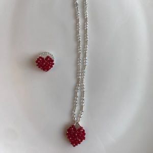 Hand beaded necklace and matching ring.